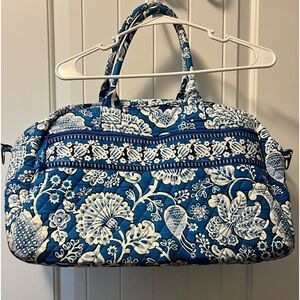 Vera Bradley “overnight bag”.